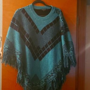 Vertigo fringe ponch size medium